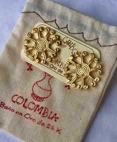 "This piece was hand-picked during my recent trip to Bogotá, Colombia.  For the people of ancient Colombia, Gold had a profound symbolic value. With its colour and radiance, an analogy with the sun was established. The golden disc, the father of Gold, and a powerful symbol of fertility. \"The sun is the radiance of God's glory and the exact representation of his being, sustaining all things \"  Each piece of jewelry in this unique collection features genuine gemstones set in 24k gold over bronze/brass and tells the time honored story of the native Colombian artisans and their incredible past that continues to evolve today. Join the journey to Colombia! Componets: Base in an alloy of metals with double plating of 24k gold. Each earring is a perfect circle measuring 1\" diameter Original Pre Colombian Gold, Colombian Jewelry, Native Symbols, Sun Symbol, God's Glory, Perfect Circle, Gods Glory, Precious Jewels, Telling Time