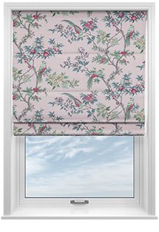 a pink roman blind with flowers on it