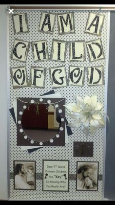 a bulletin board with pictures and writing on it that says i am a child of god