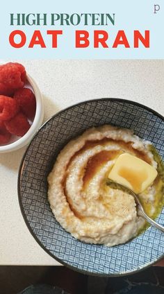 a bowl filled with oatmeal next to a bowl of raspberries