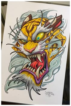 a drawing of a tiger's head with fangs