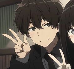 two anime characters giving the peace sign