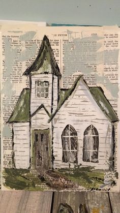 a drawing of a white church on top of a piece of paper with words written in it