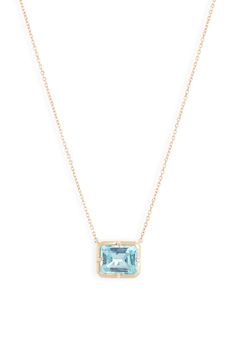 An emerald-cut topaz in a dreamy blue hue beams at the heart of this 14-karat gold pendant necklace that adds an elegant pop of color to your neckline. 3/8"W x 1/4"L pendant 14k-gold/blue topaz Made in Canada Blue Baguette Cut Necklaces For Gifts, Blue Topaz Pendant Necklace, Key Pendant Necklace, Bar Pendant Necklace, Blue Topaz Necklace, Blue Topaz Pendant, Topaz Pendant, Topaz Necklace, Diamond Bar