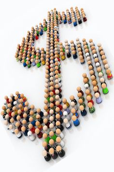 a large group of people standing in the shape of an arrow