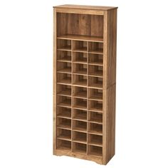 a tall wooden bookcase with many compartments