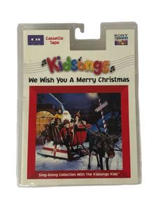 a christmas card with an image of children riding in a sleigh on it