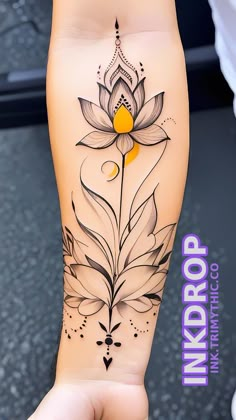 a woman's leg with a flower tattoo on it and the words ink drop