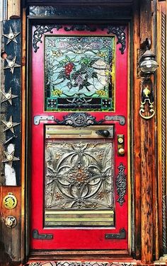 a red door with an ornate design on it