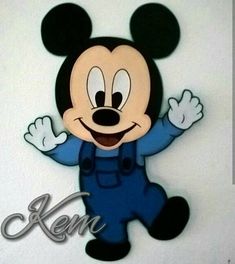 a mickey mouse cutout with the name kenn on it's face and arms