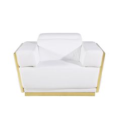 a white and gold couch with pillows on top of it's backrests