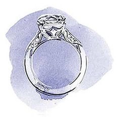 a white gold engagement ring with an oval center stone