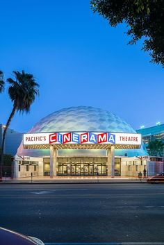 an empty street in front of a movie theater