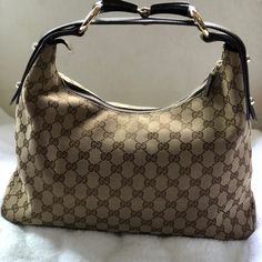 I’m Selling This 100% Authentic Gucci Monogram Medium Size Horsebit Chain Hobo Bag In Brown. I’m The First Owner Of This Bag, And It’s In Very Good Condition, There Is A Sign Of Wear On The Canvas(Shown In Picture), Other Than That I Kept It In It’s Original Dust Bag. This Comes From A Smoke Free Home. Pls Feel Free To Ask Any Questions. Thanks For Looking!! Gucci Hobo Bag, Brown I, Bags Gucci, Gucci Horsebit, Gucci Monogram, Gucci Bamboo, Hobo Purse, Hobo Style, Madden Girl Shoes