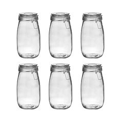 six clear glass jars with lids