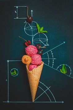 an ice cream cone with three scoops of ice cream in it on a black background