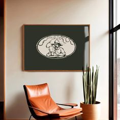 an orange chair sitting in front of a window next to a potted snake plant