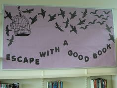 there is a sign that says escape with a birdcage in the sky above bookshelves