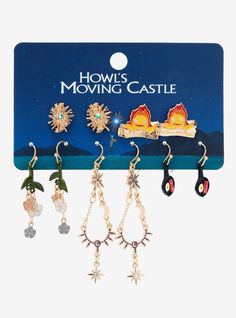 Get ready for your next visit to the moving castle in style with this Studio Ghibli earring set! Inspired by Howl's Moving Castle   this set includes two stud earrings of Calcifer and a Star Child with rhinestone details and three hook earrings with floral  star  and frying pan charms. These earrings are perfect for bringing some sparkle and magic to your outfit. A BoxLunch Exclusive! Studio Ghibli Jewelry, Ghibli Jewelry, Studio Ghibli Earrings, Castle Jewelry, Anime Tote Bag, Star Child, Anime Jewelry, Howl's Moving Castle, Studio Ghibli Movies