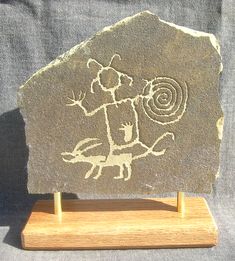 a rock with an animal carving on it