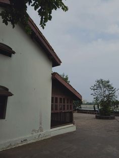 an old building with a clock tower in the background