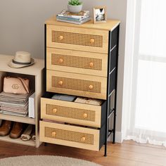 a wooden dresser with drawers and shoes on it