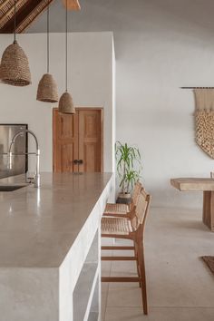 the kitchen is clean and ready to be used as a dining room or living area