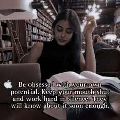 a woman sitting at a table with an open book in front of her, and the caption reads be obsesed with your own potential keep your mouth shut and work hard