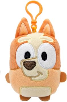 a small stuffed animal keychain with an orange and white cat on it's face