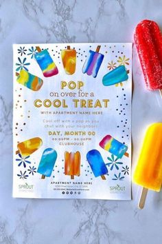 two popsicles and an ice cream bar on a marble counter top, with the title pop on over for a cool treat