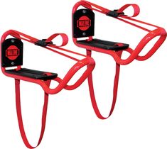 two red bike racks with handles and hooks