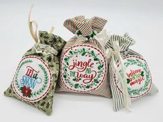 three bags with christmas designs on them