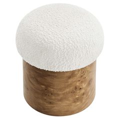 a white and wood stool with a round top on an isolated white background for use as a footstool