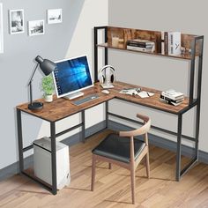 a corner desk with a computer on it