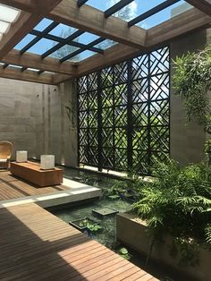 an outdoor living area with wooden flooring and walls