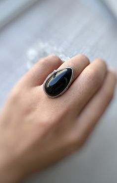 Silver ring with natural black obsidian for women! This ring is a perfect gift idea to the one who loves natural black color of stone and minimalist style) The ring size is adjustable, so you can give a gift without knowing the size! But if you want we can make any size of this ring! Also, we can make matching earrings, pendants, and bracelets! Just message me) Choosing Shahinian Jewelry, you choose the unique design, the best quality, and the perfect look! Ring weight: 10,5 gr ✍️If you have any Elegant Teardrop Natural Stone Rings, Elegant Obsidian Ring Jewelry, Black Teardrop Rings For Gift, Black Teardrop Ring For Gift, Minimalist Handmade Black Ring, Black Rings With Natural Stones For Gift, Black Obsidian Gemstone Ring, Black Teardrop Natural Stone Jewelry, Black Obsidian Rings For Gift