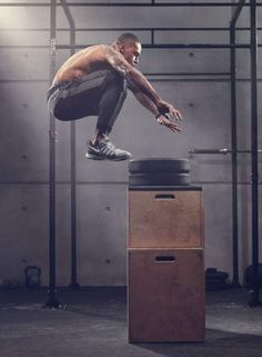 a man doing a trick on top of a box