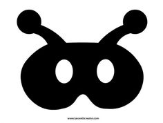 a black and white image of a mask with two circles on the front of it