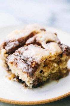 a piece of cake sitting on top of a white plate