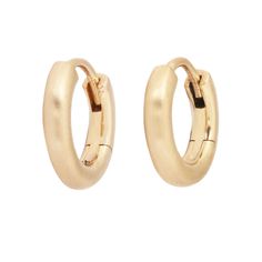 These gold hoop earrings are a timeless everyday staple. Wear on their own or style with other earrings as part of your authentic look. Every part of these gold earrings are handcrafted in NYC by Shane Yamane.Metal: Recycled 14k Yellow Gold Measurements: 7mm Internal Diameter 14k Yellow Gold Round Hoop Earrings, Everyday Luxury Classic Round Huggie Earrings, Formal 14k Gold Small Hoop Huggie Earrings, 14k Gold Small Hoop Huggie Earrings For Formal Occasions, 14k Gold Huggie Hoop Earrings With Spring Ring Clasp, 14k Gold Huggie Hoop Earrings Tarnish Resistant, Classic Small Hoop Huggie Earrings In 14k Gold, 14k Gold Tarnish Resistant Huggie Hoop Earrings, Timeless 14k Gold Hypoallergenic Hoop Earrings