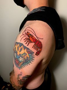 a man with a tattoo on his arm