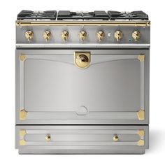 a silver and gold stove with four burners