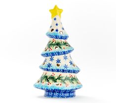 a ceramic christmas tree on a white background