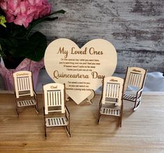 miniature chairs and a heart shaped plaque with the words, my loved ones quinceenara day