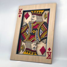 an image of a playing card made out of wood