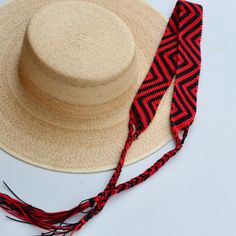 These Beautiful hat bands are carefully  hand woven by Rosa in Chiapas,Mexico. Each band showcases a unique and colorful patterned design using traditional macrame techniques.  Add a touch of handmade artistry to your hat collection  today! - Width 1 3/4"  - Length: 23 inches, not including fringe - Fringe 10" each side   - Fits most hats - Polyester yarn  - All items are shipped from US. All Mi Mundo Mexicano items are 100% handmade by artisans in Mexico. Each stitch and item is completely unique and one-of-a-kind, so you'll never find two that are exactly the same! * Your Purchase supports artisans craft and families ! Handwoven Natural Hat Band With Flat Brim, Adjustable Curved Brim Handwoven Panama Hat, Woven Panama Hat With Curved Brim For Festivals, Handwoven Adjustable Curved Brim Panama Hat, Adjustable Woven Hat Band For Vacation, Curved Brim Woven Panama Hat For Festivals, Adjustable Woven Hats, Adjustable Woven Hats One Size, Casual Woven Hat Bands For Festivals