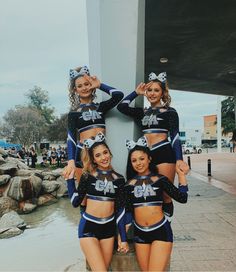 the cheerleaders are posing for a photo together