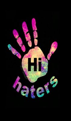 a hand with the word haters painted on it in pink and green colors, against a black background