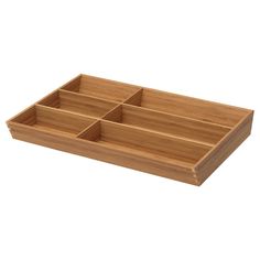 a wooden tray with three compartments on it