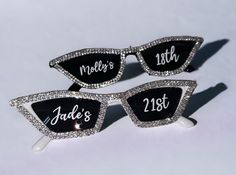 two black and white sunglasses with the name jade's 21st on them are sitting next to each other